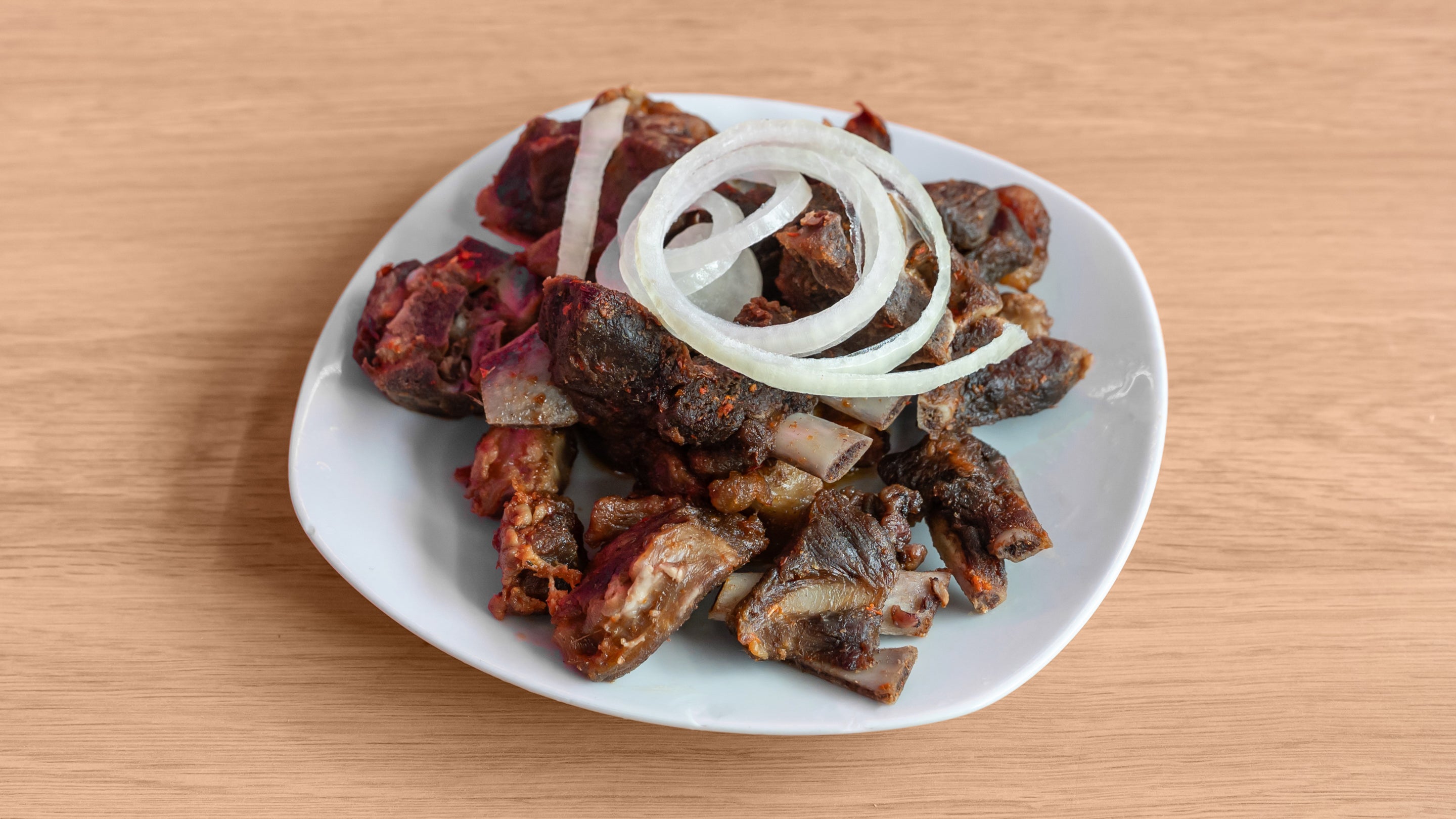 Peppered Kpomo