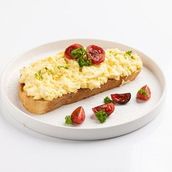 Scrambled eggs with cherry tomatoes