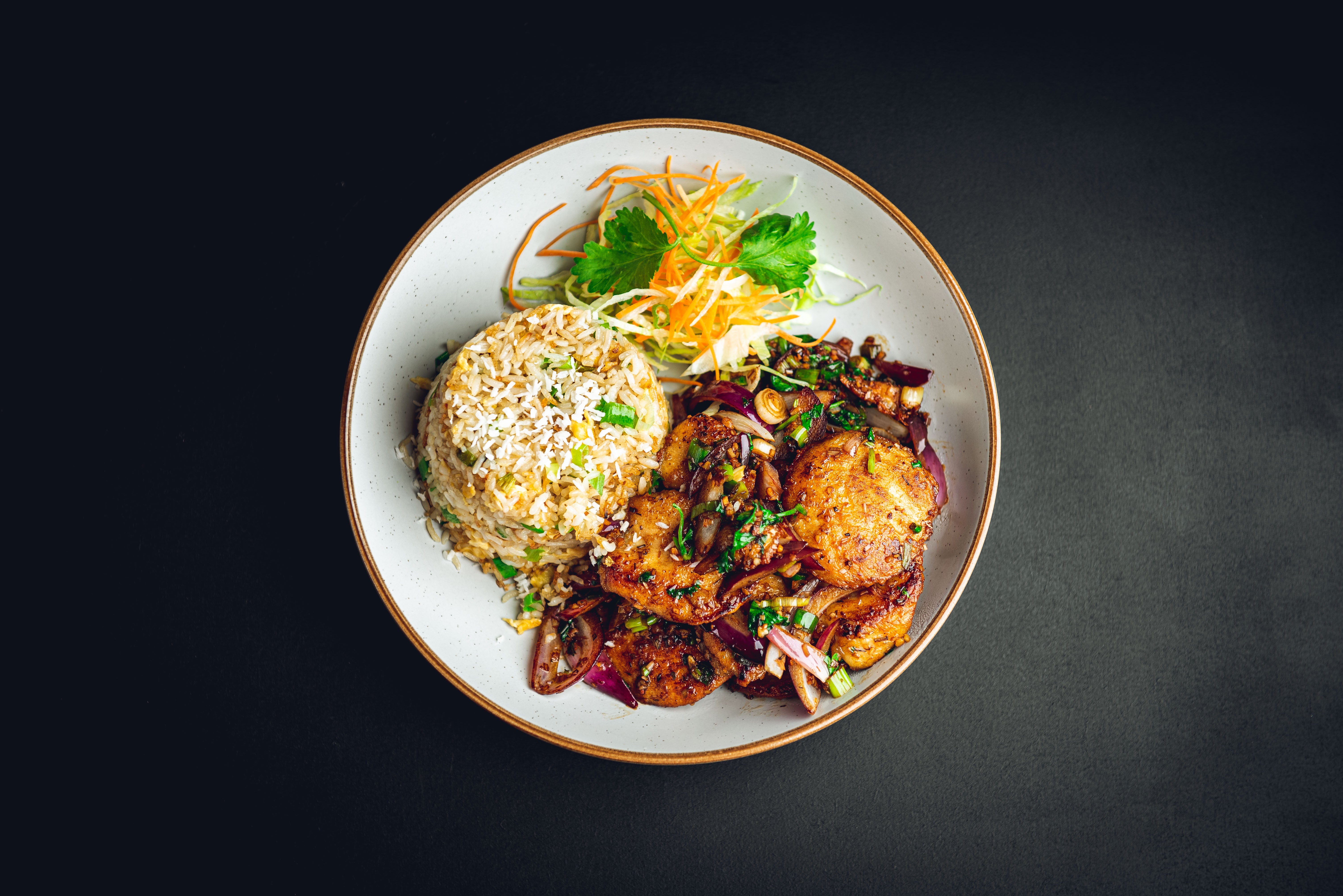 Pan Fried Lemon Grass Chicken Served with a Coconut Fried Rice