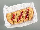 Toast With Peanuts And Granola And Jam