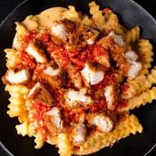 Special Fries With Chicken Pieces And Potato Cheese