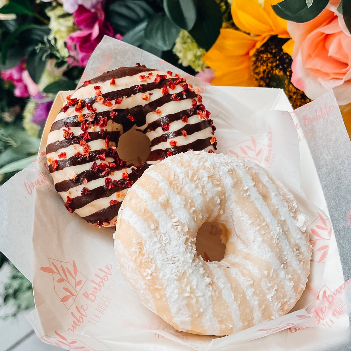 2 Glazed Doughnut with filling and top decor