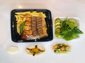 A quarter of a mixed grill platter