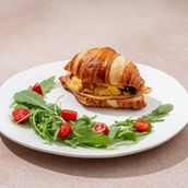 Scrambled Eggs with Croissant and Sun Dried Tomato