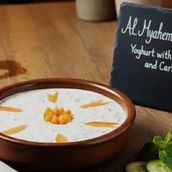Yogurt with cucumber and carrots