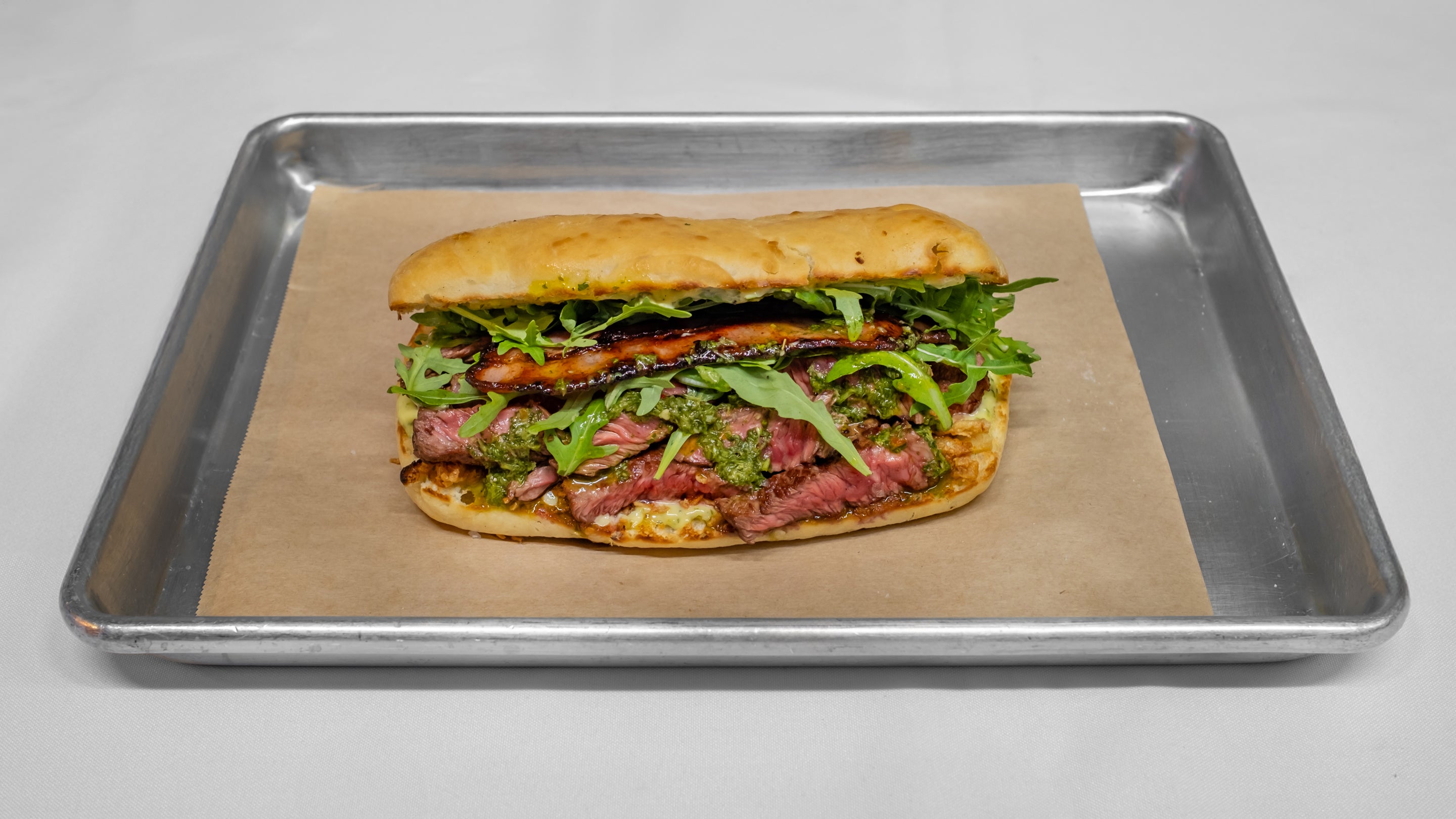 Steak Sandwich With Cheese and Bacon