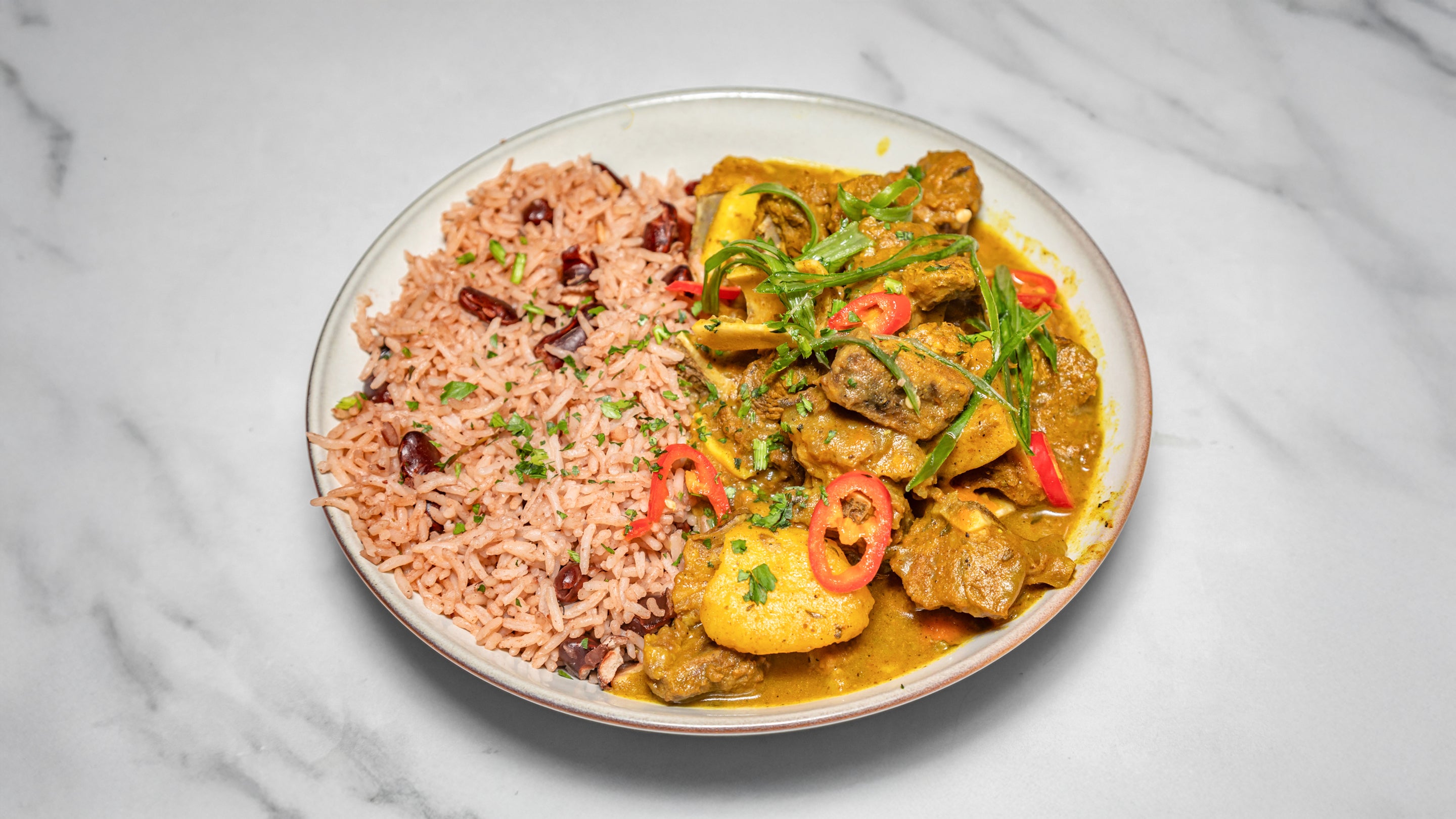 Curry Goat and Rice Peas
