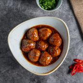 VEGETABLE DUMPLINGS MANCHURIAN SAUCE