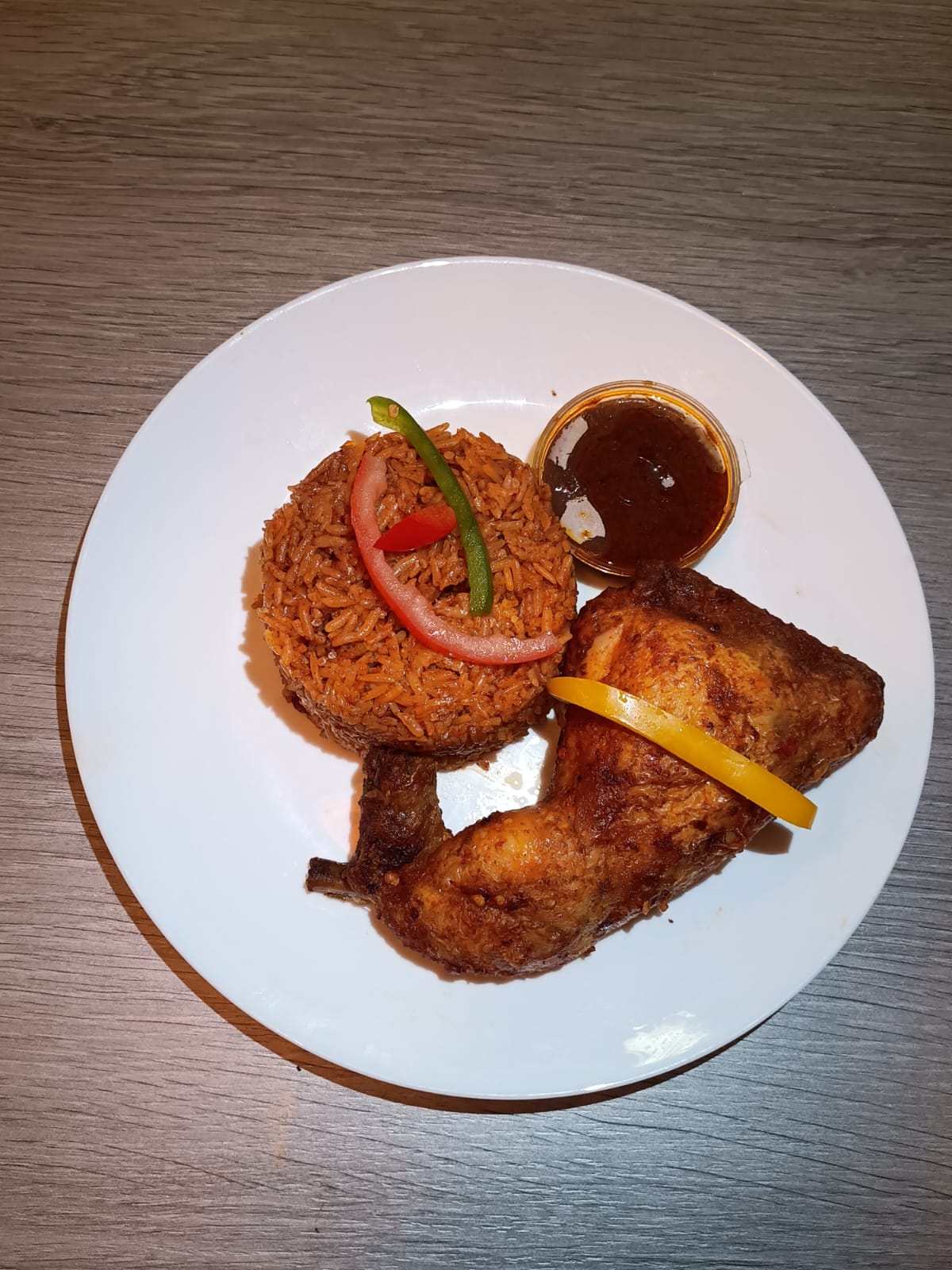 Jollof Rice with 1/4 Leg Chicken