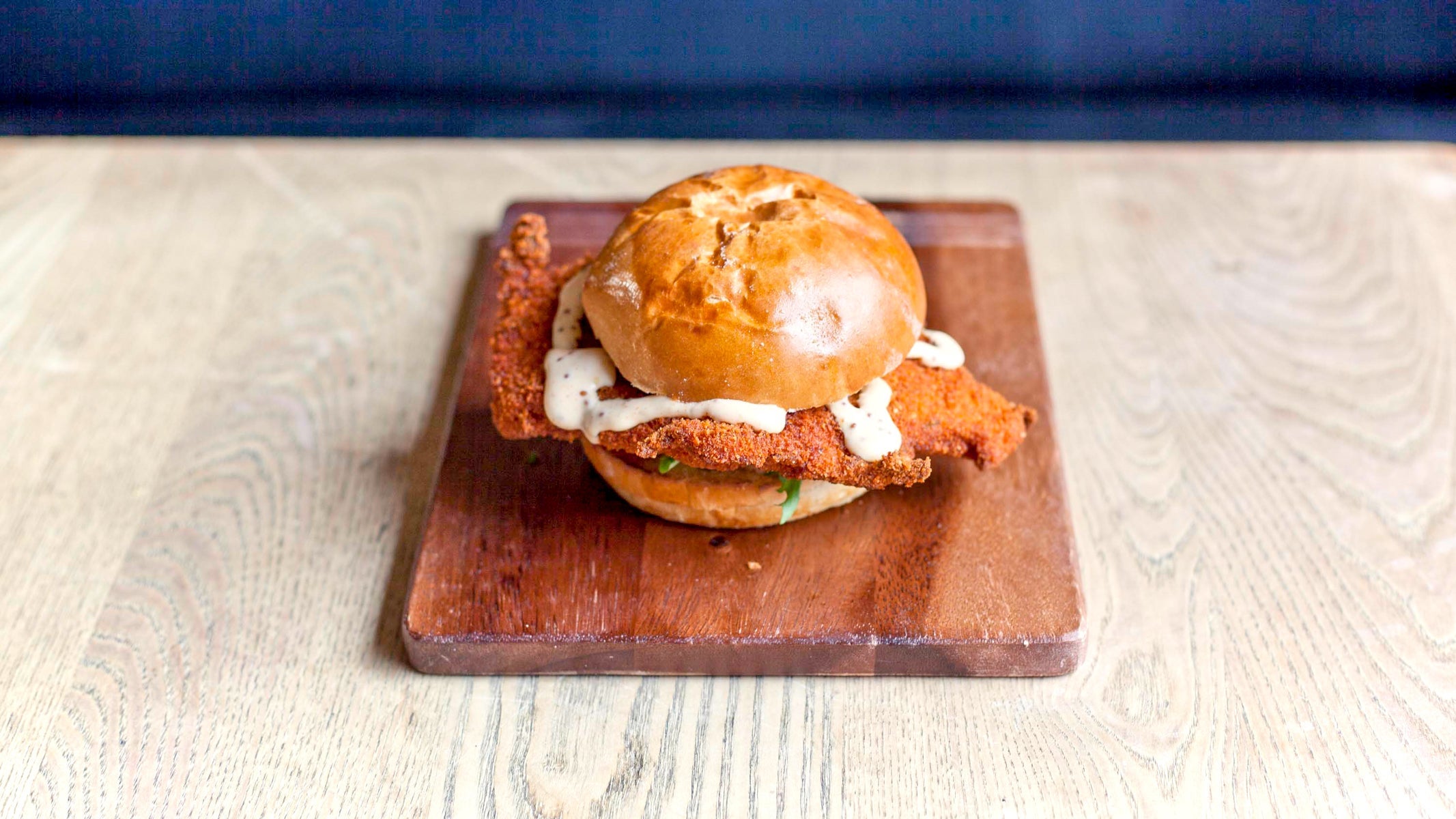 Homemade Chicken Schnitzel Burger and fries