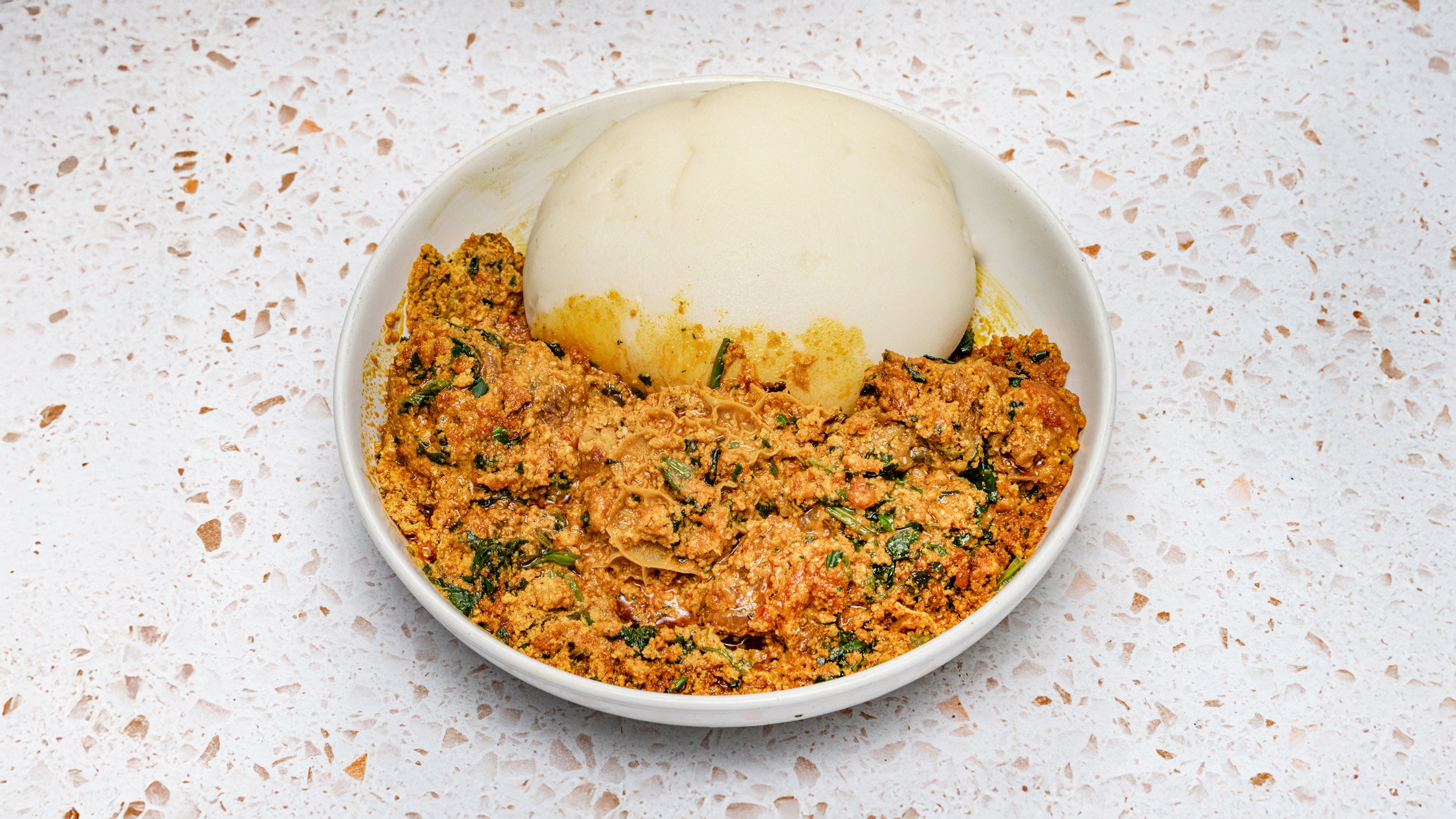 Egusi Soup and Pounded Yam (With Assorted Meat)