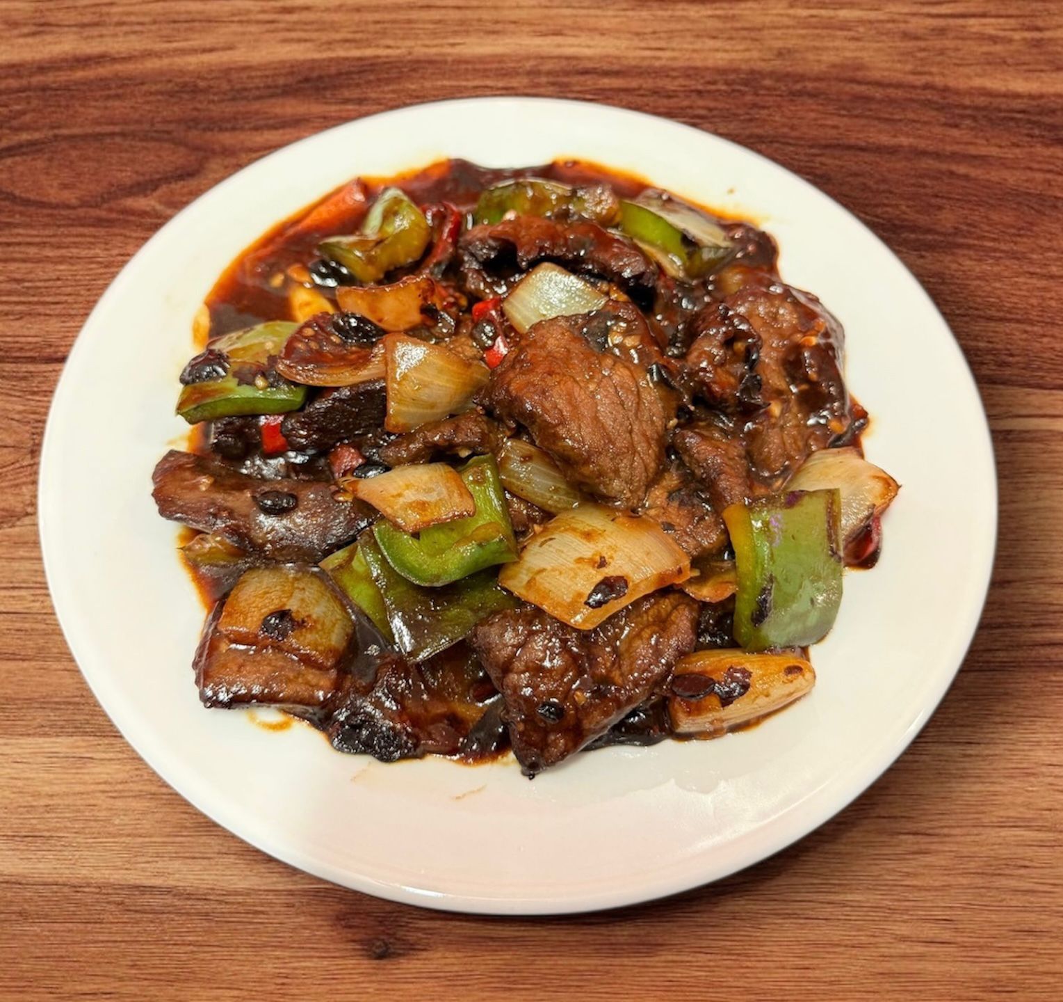 Stir Fried Beef in Black Bean Sauce (士召牛)