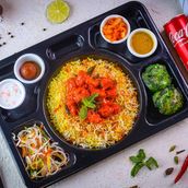Chicken65 Biryani with Hariyali Chicken Tikka and Soft Drink Combo
