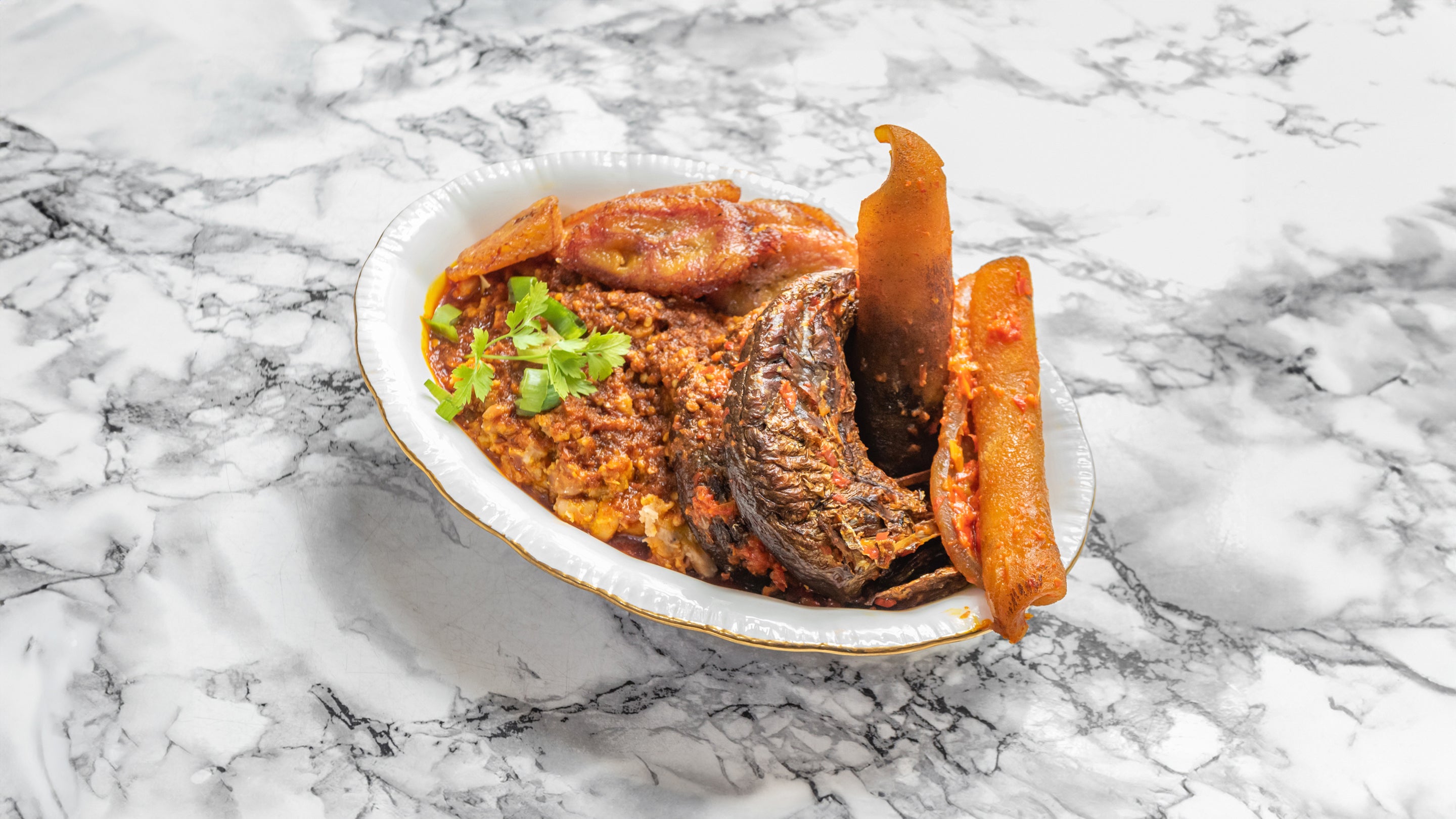 Ewa Aganyin with sauce