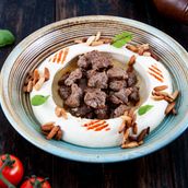 hummos topped with meat