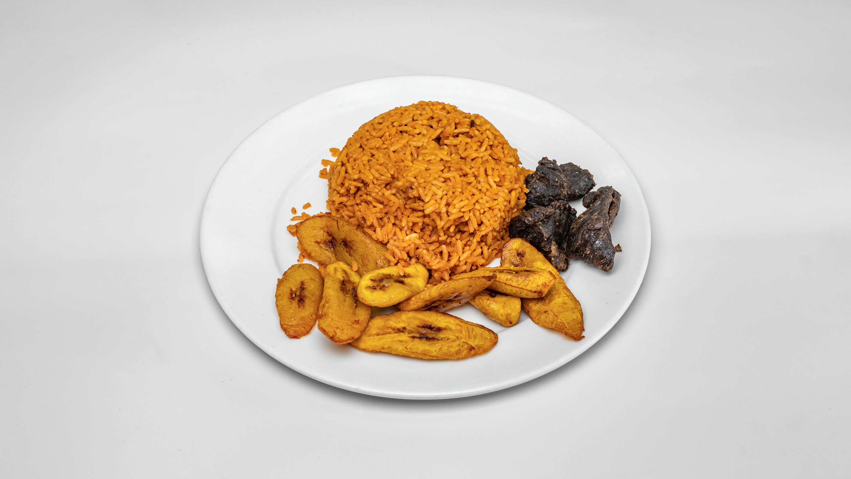 Jollof (single),3 pc goat meat and plantain