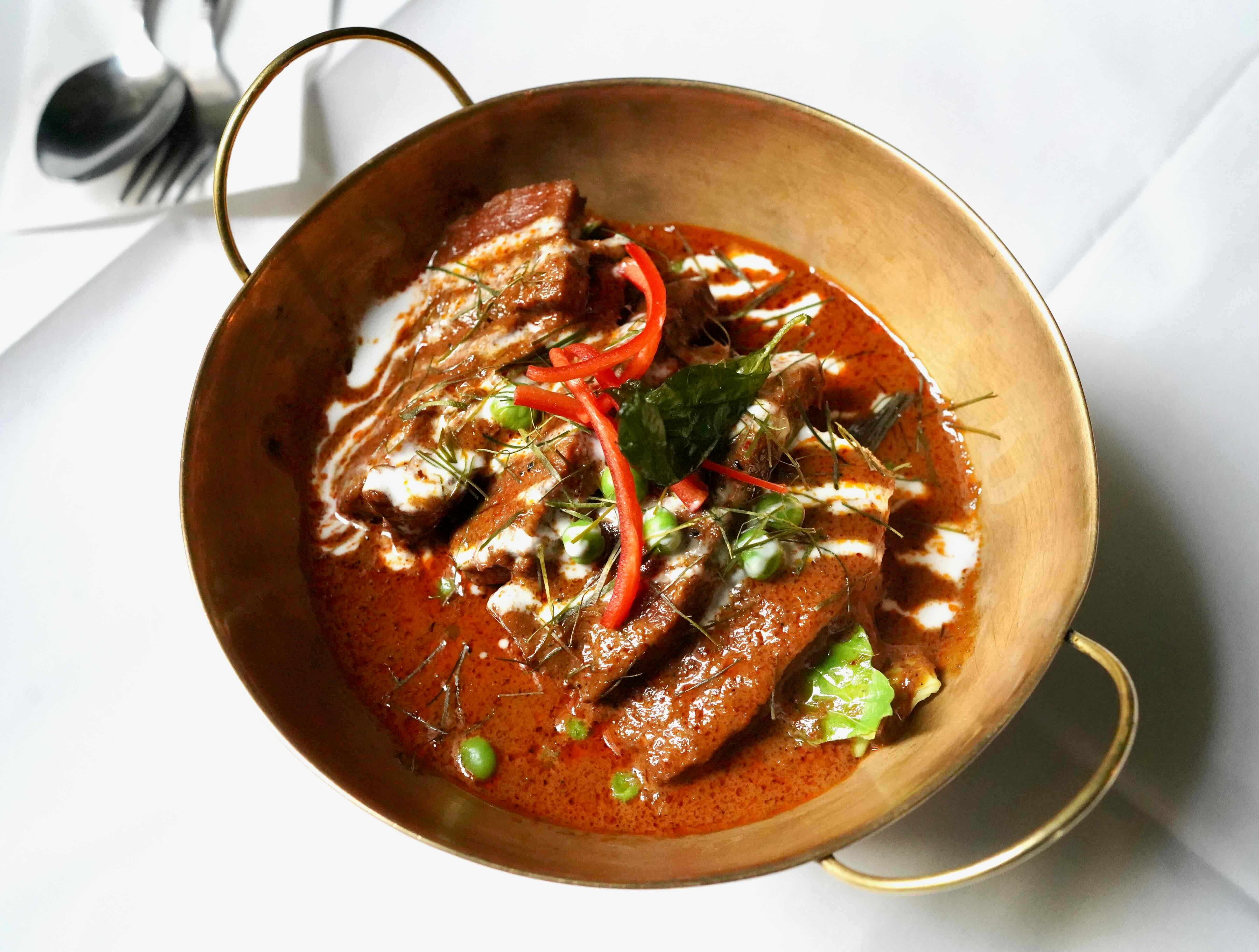 Vegan steak with red panang curry sauce