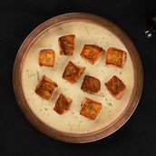 Salmon Cubes with Cheesy Sauce