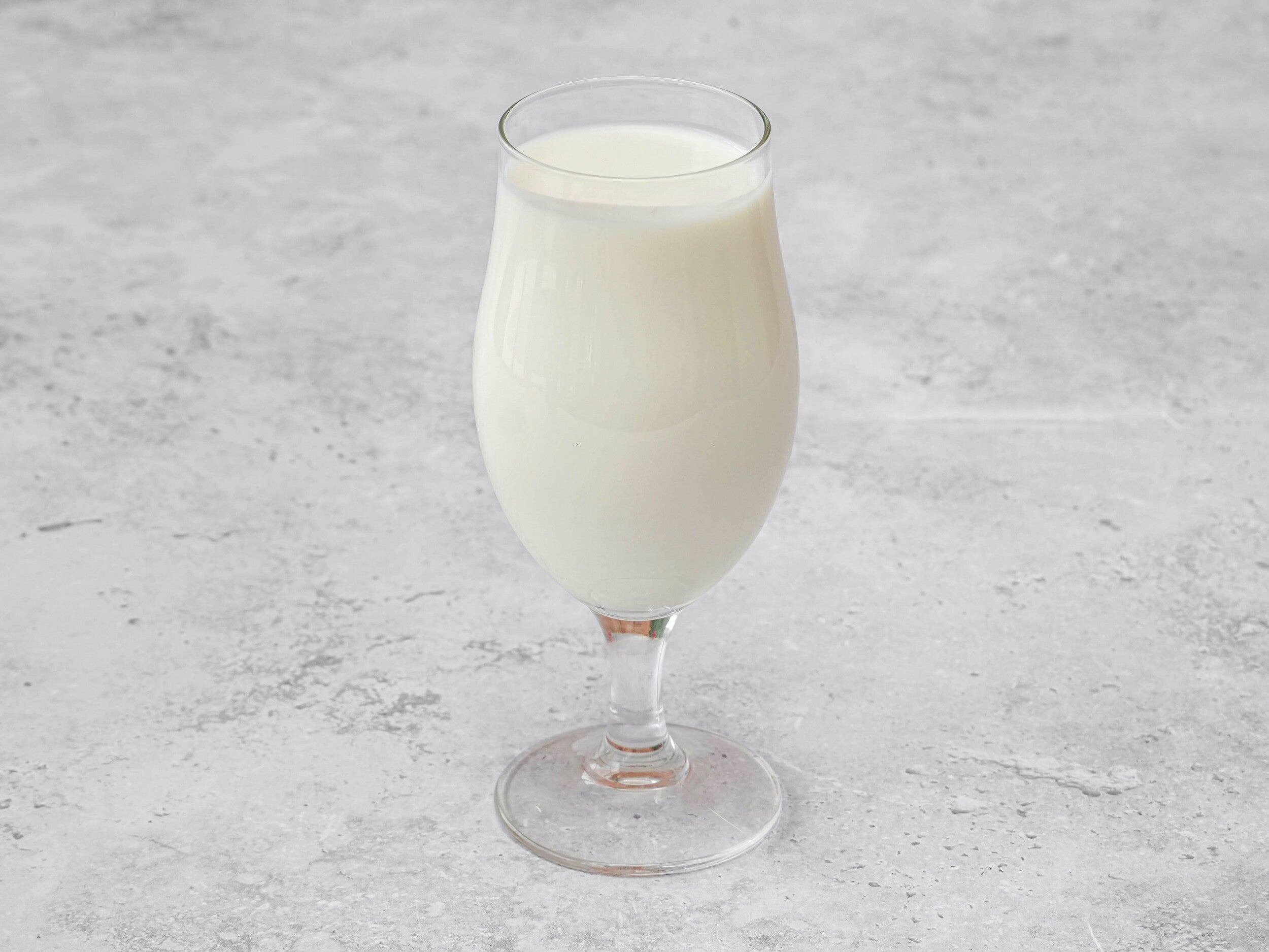Sweet lassi with touch of coconut.