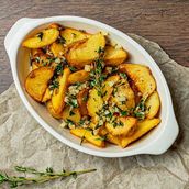 Garlic lemon and thyme potato wedges