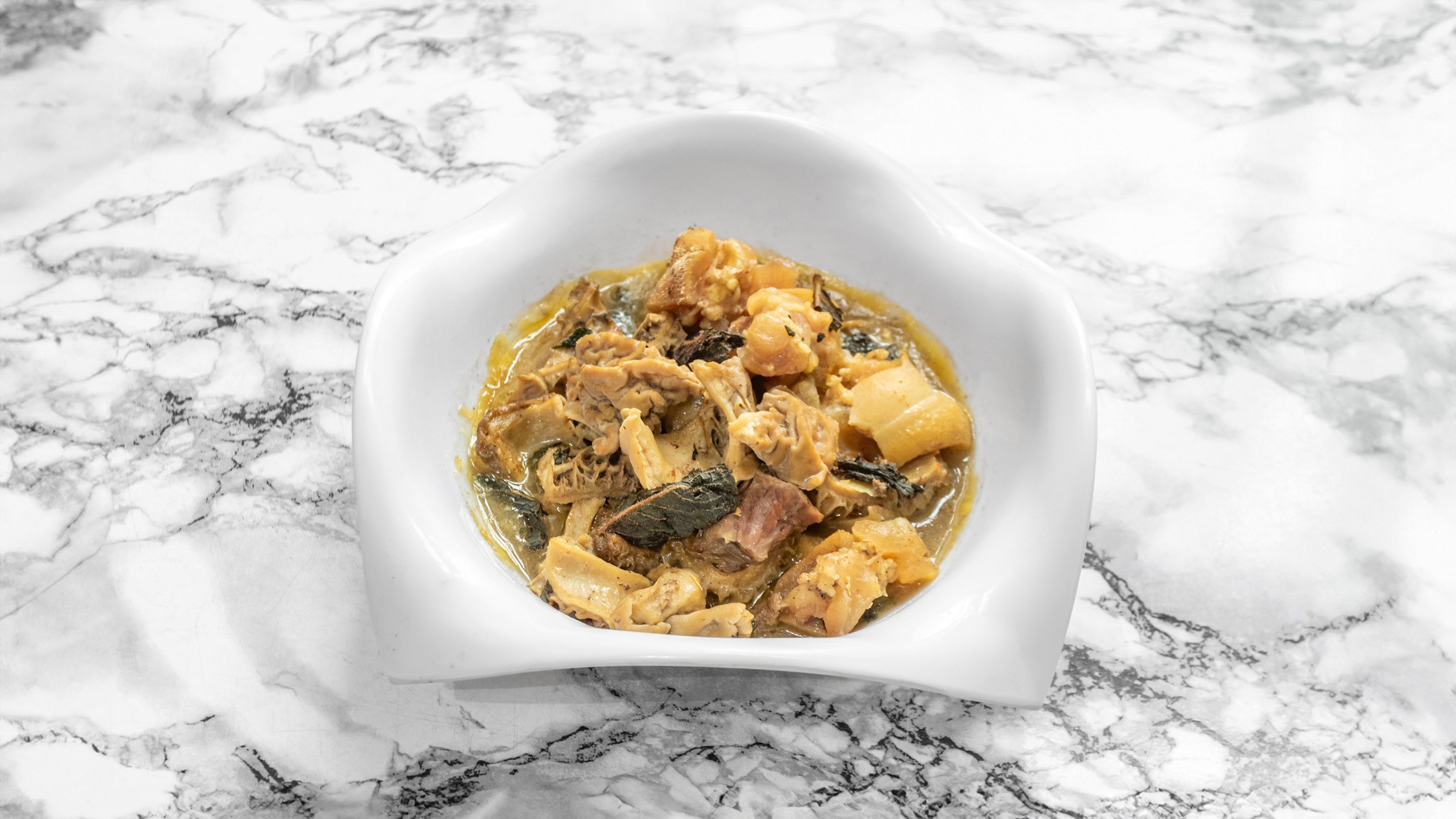 Peppersoup (assorted meat/fish)