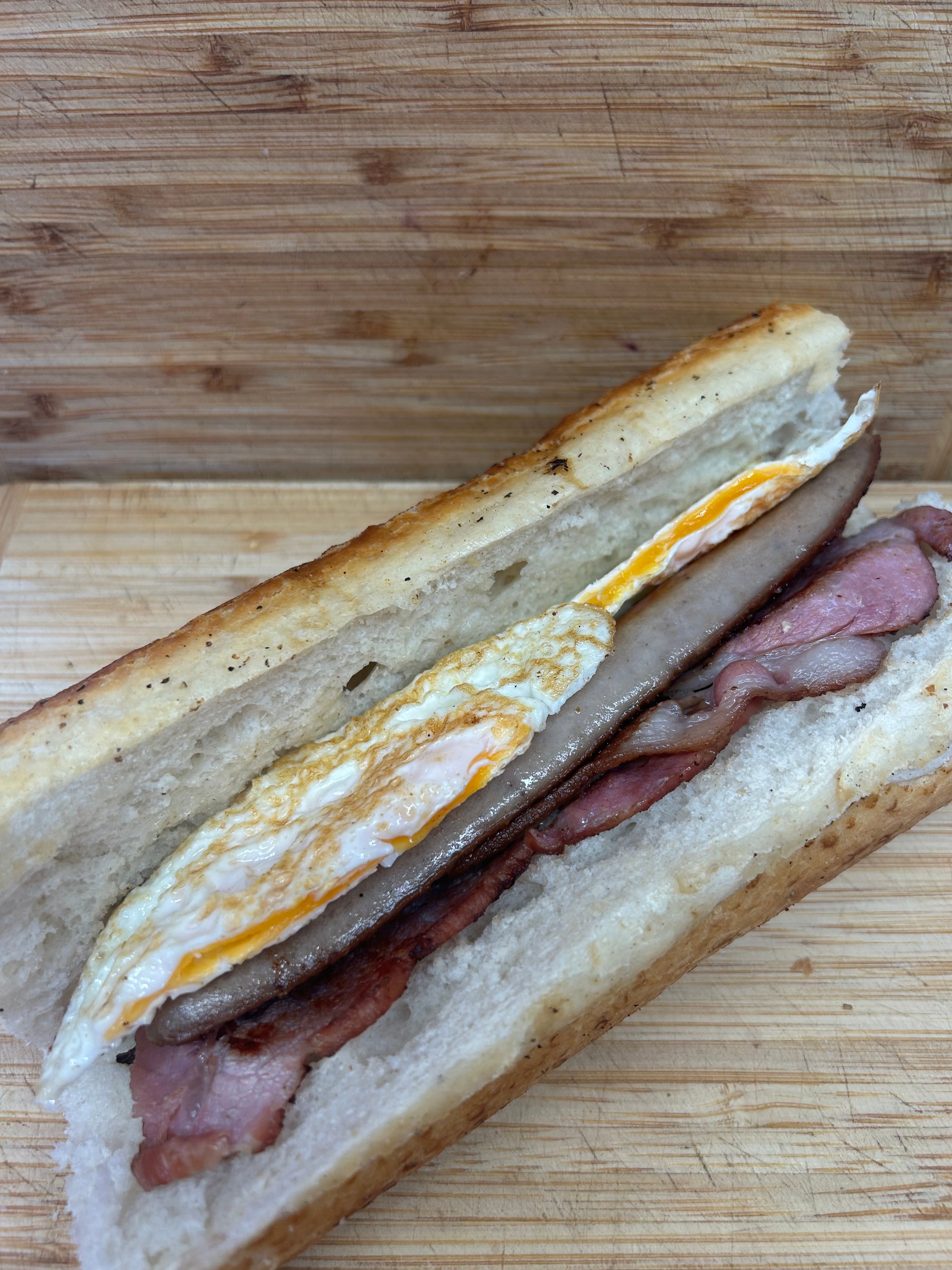 Sausage. Bacon & Egg Baguette