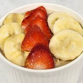 Overnight Oats With Banana Slices And Fresh Strawberry Slices 