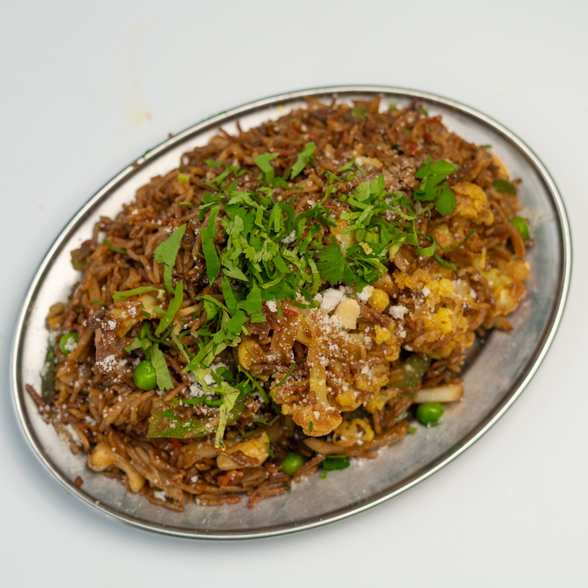 Vegetable served with curry sauce