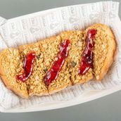 Toast With Peanuts And Granola And Jam