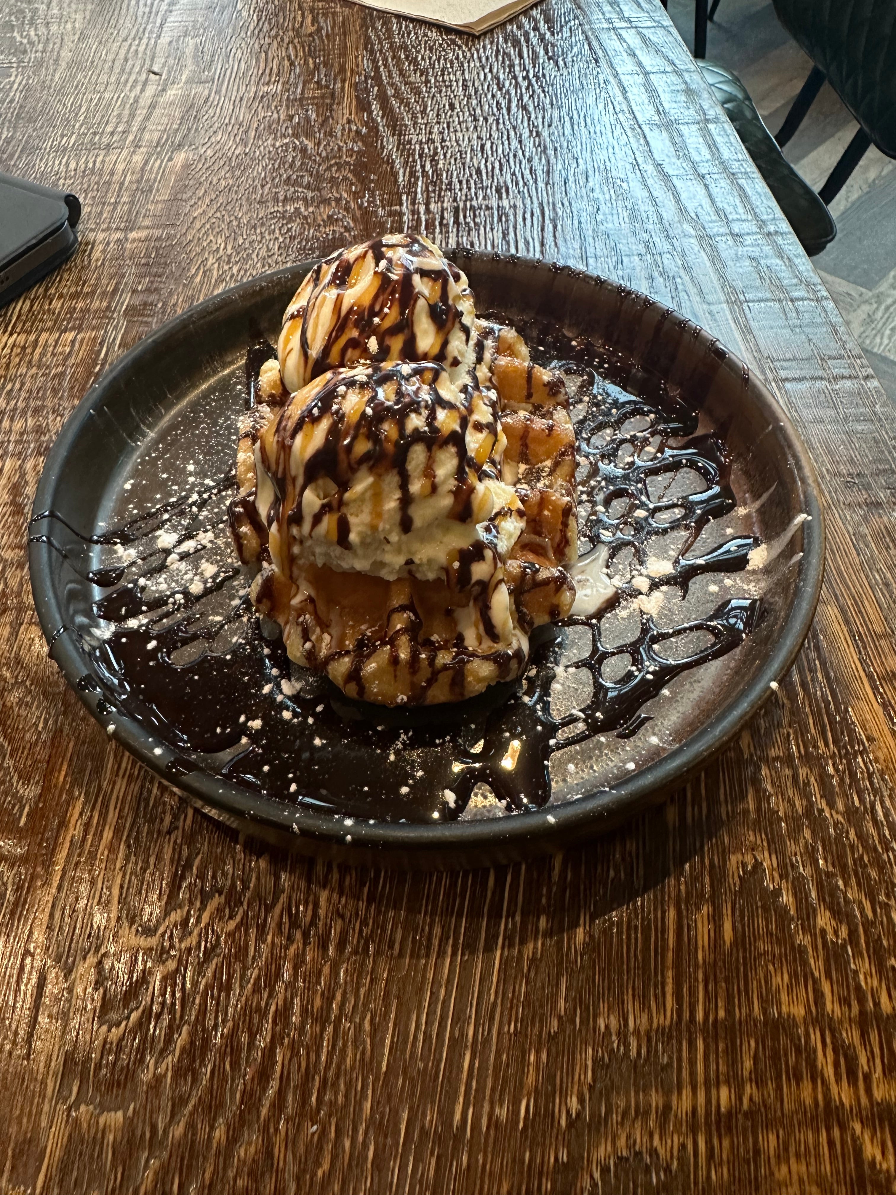 Salted caramel and chocolate and hot waffle with ice cream