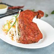 TANDOORI CHICKEN TIKKA QUARTER Chutney with salad and hummus