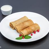 Blinchik and Pancake With Meat