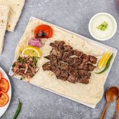 Lemon meat tikka with bread