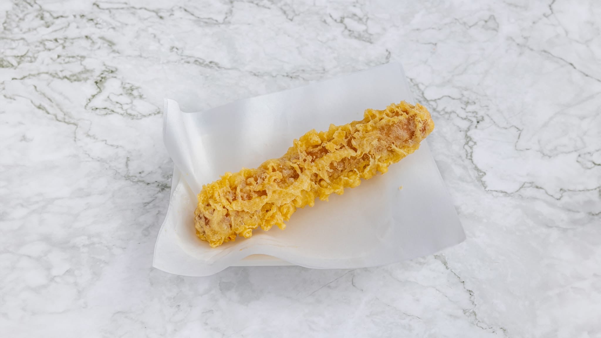 Battered sausage and chips