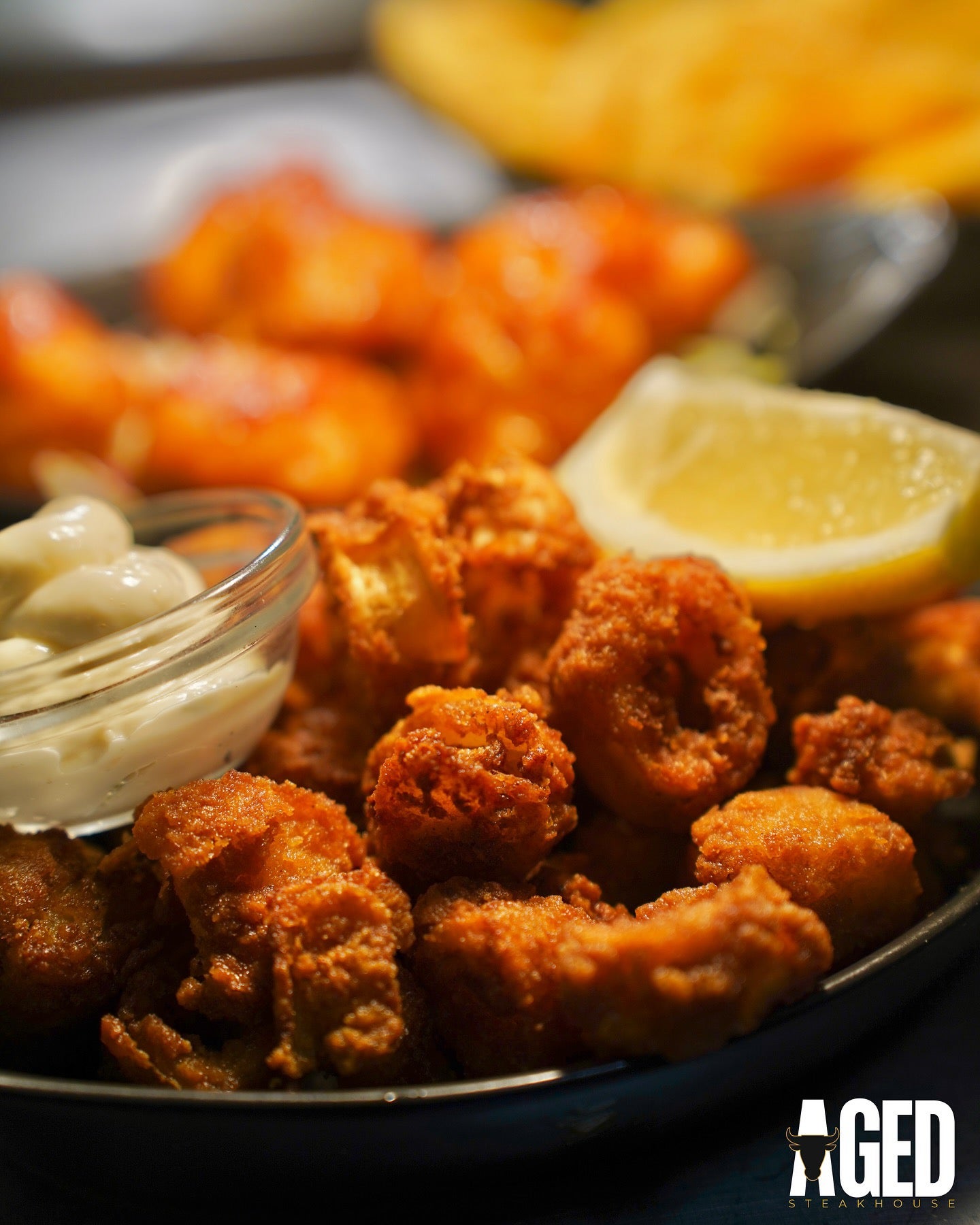 Crispy Baby Calamari with Tartar Sauce and Lemon Wedge