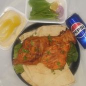 1/2 Grilled Chicken With Hommes And Pepsi