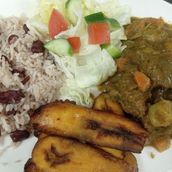Curry Goat With Rice And Peas With Plantain
