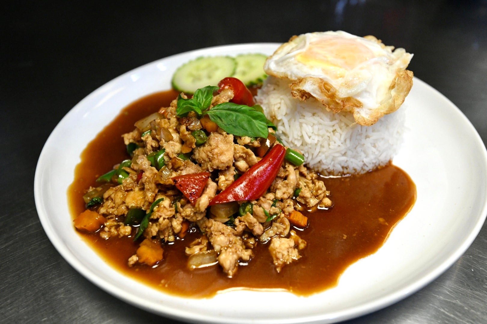 Stir fry Basil With Minced Chicken, Fried Egg and Steamed Rice
