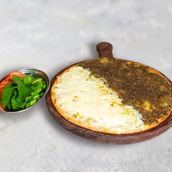 Zaatar and cheese manakish