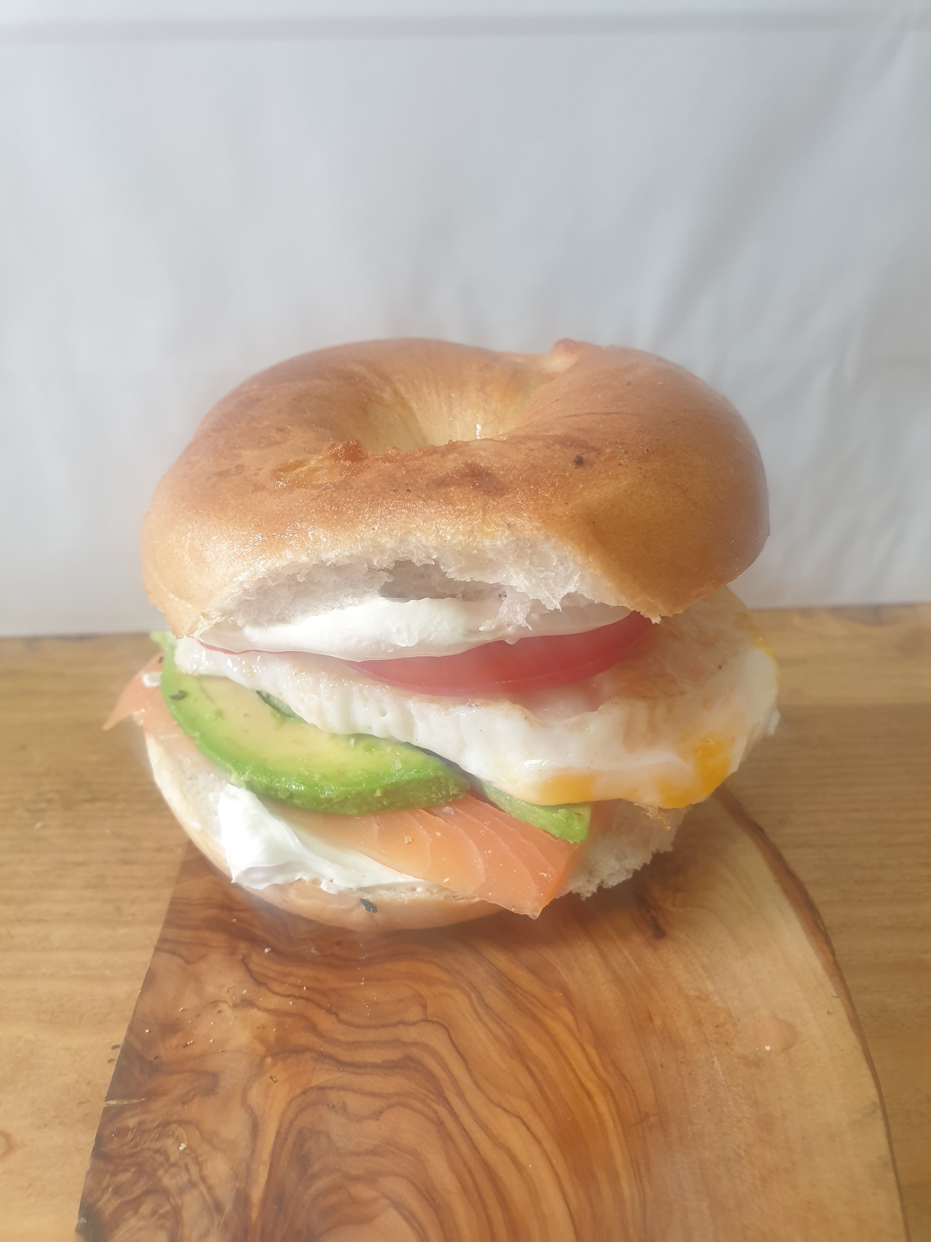 Salmon Cream Cheese Egg Tomato and Avocado Bagel