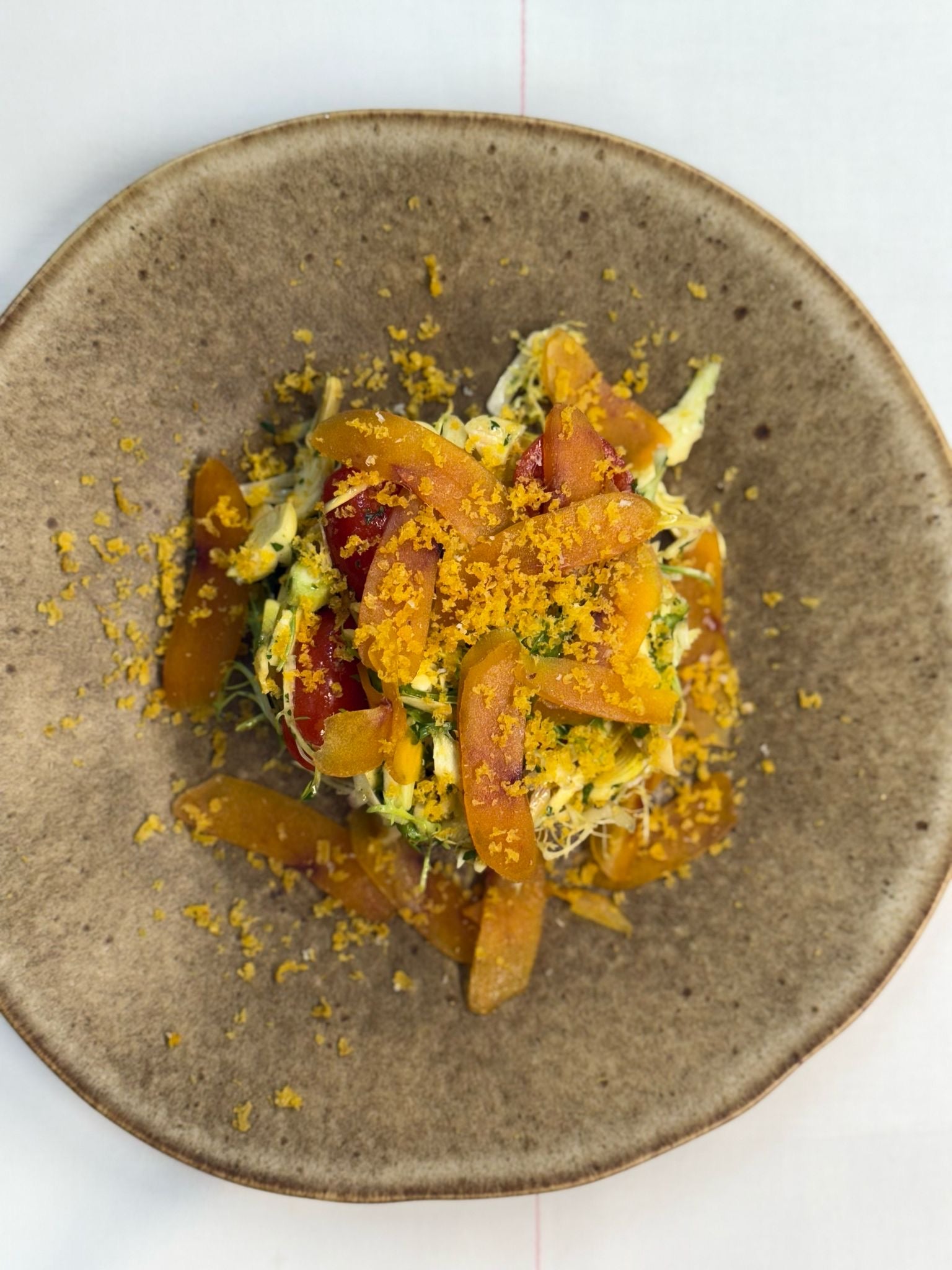 Crudo di Carciofi con carpaccio di bottarga e pomodorini