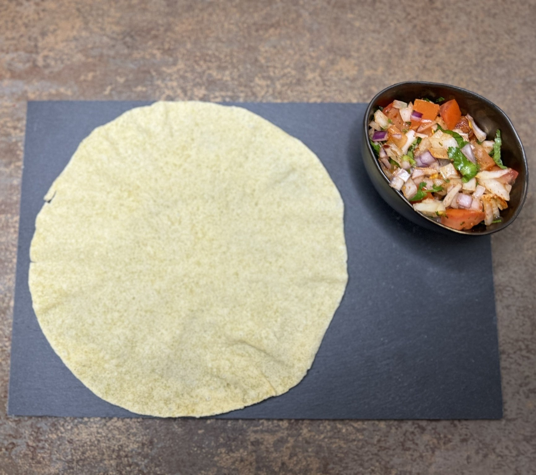 Masala Papadum (Contains Onions and Garlic)