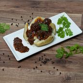 Baked Potato With Cheese And Manchurian Gravy