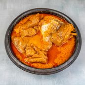 Fufu & Palm Nut Soup With Fish And Goat Meat
