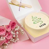 Green line 2026 cake With flowers pink 