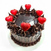 Heart Shaped Chocolate Cake With Chocolate Sauce
