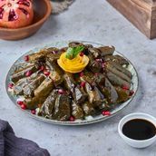 Pomegranate molasses stuffed grape leaves