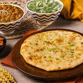 Paneer - Amritsari Tandoori Kulcha Served with Punjabi Chole & Pyaaz Ki Chutney