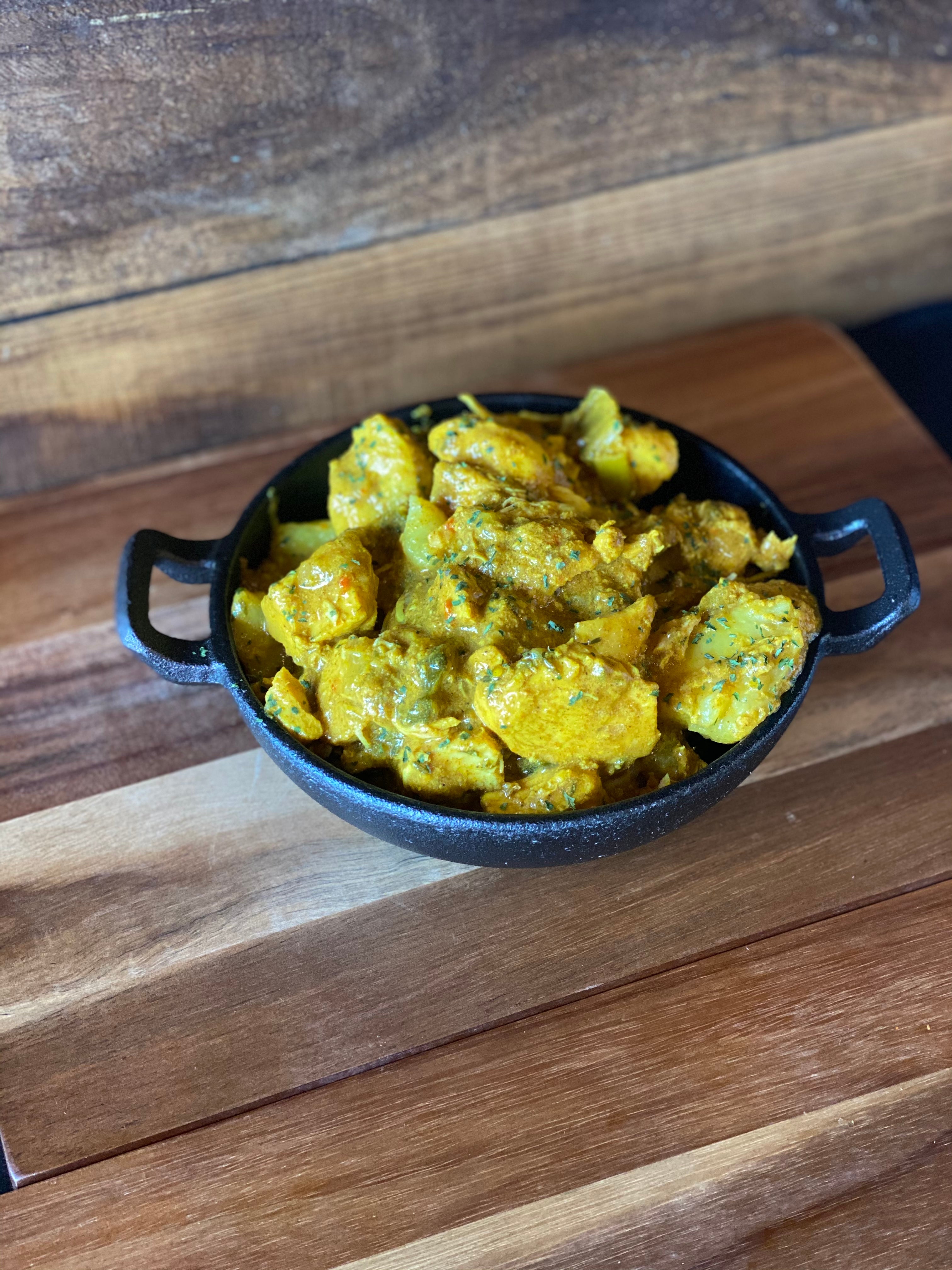 Boneless Stew Chicken Roti