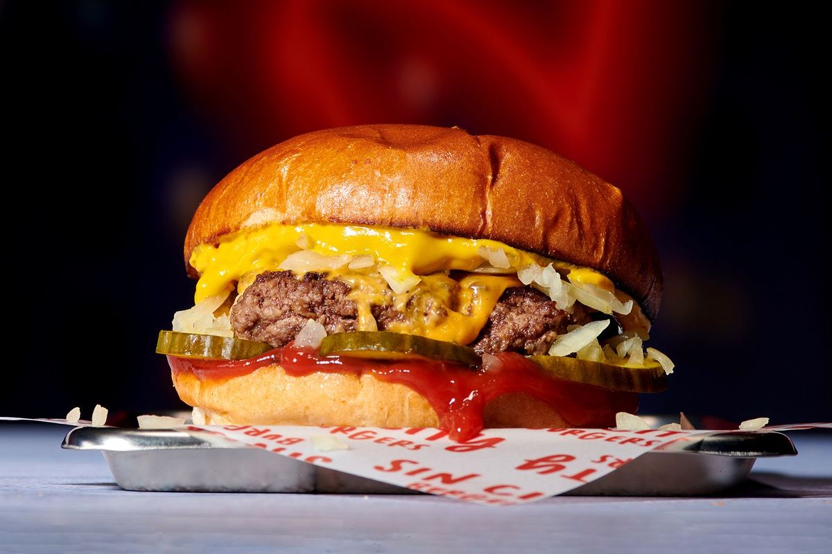 �� The Cheesy Lust �� (2393 kJ).